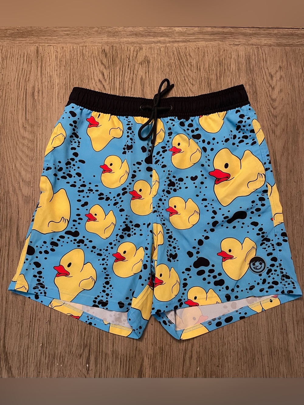 Rubber Ducky men’s swimming trunks. Large, 18” long, 6” inseam. Frnt & bck pckts